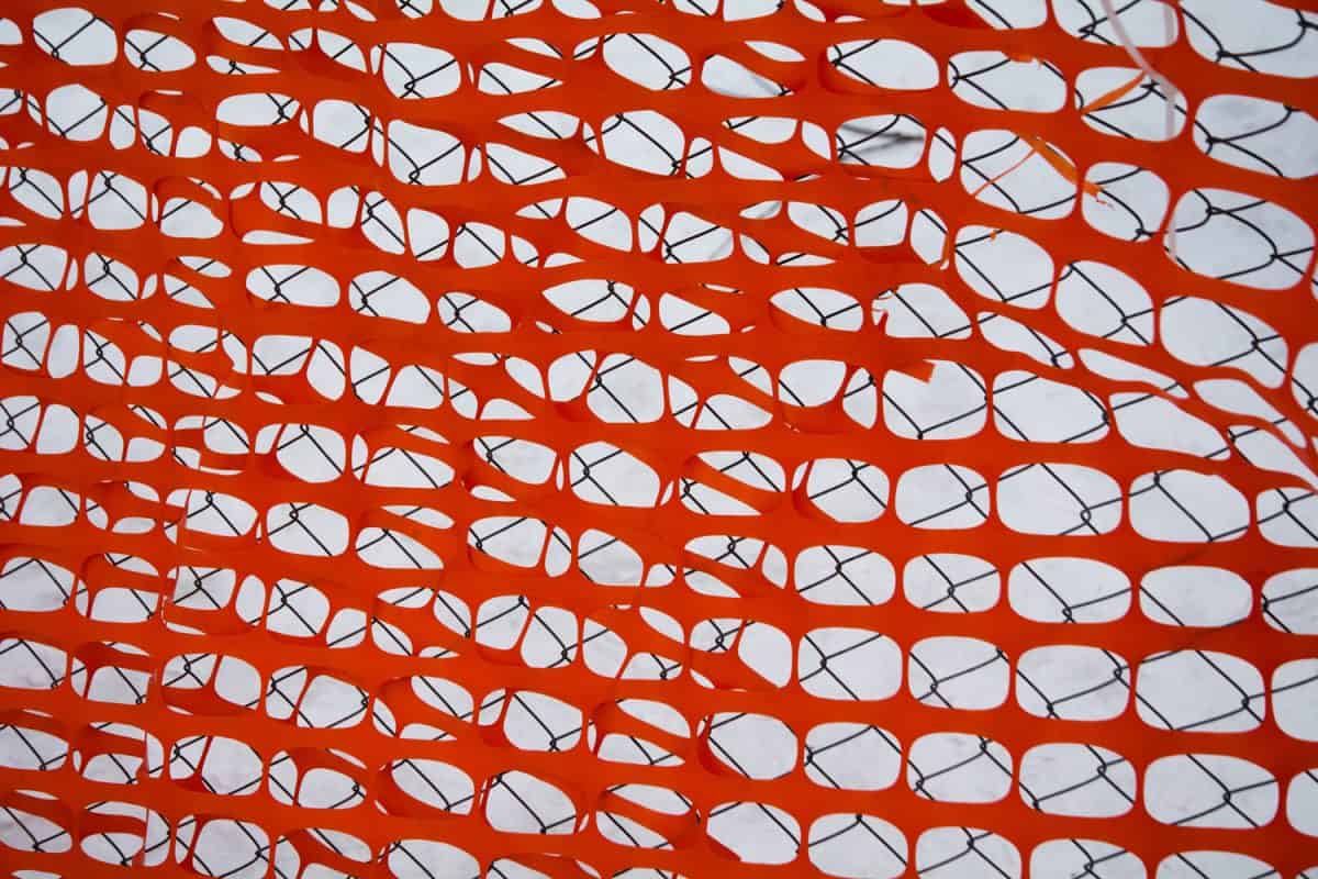 Plastic mesh for fencing. Emergency mesh. Background.
