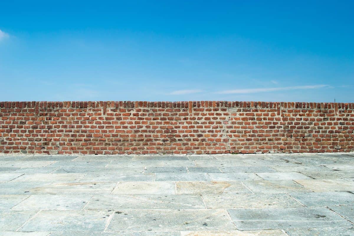 brick wall with blue sky background

