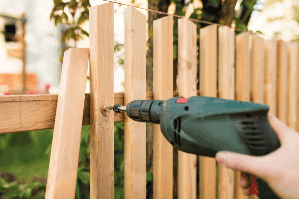 building a new wooden natural fence - work tools