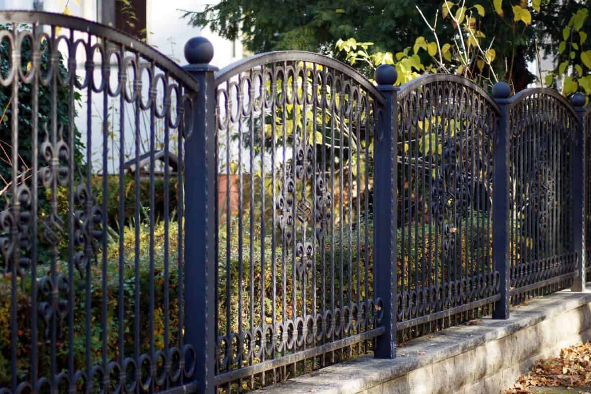 Arched wrought iron fence for a private property