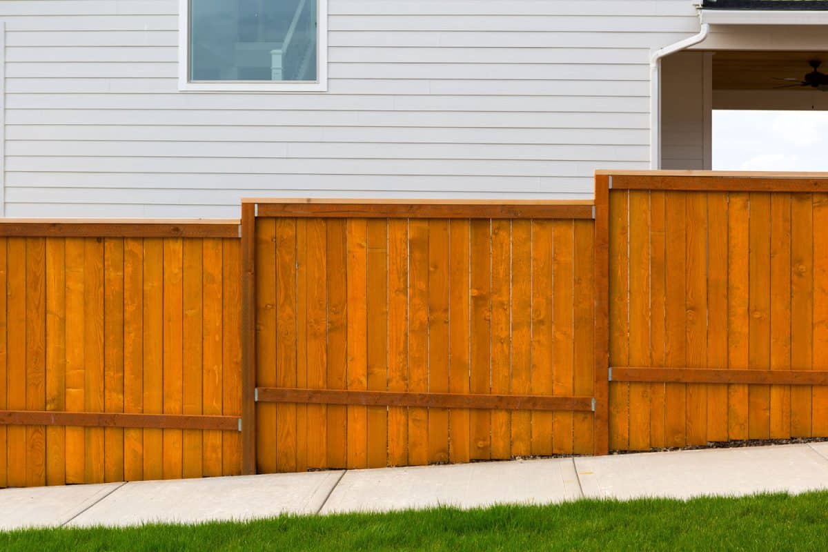 Brown varnished wooden fence
