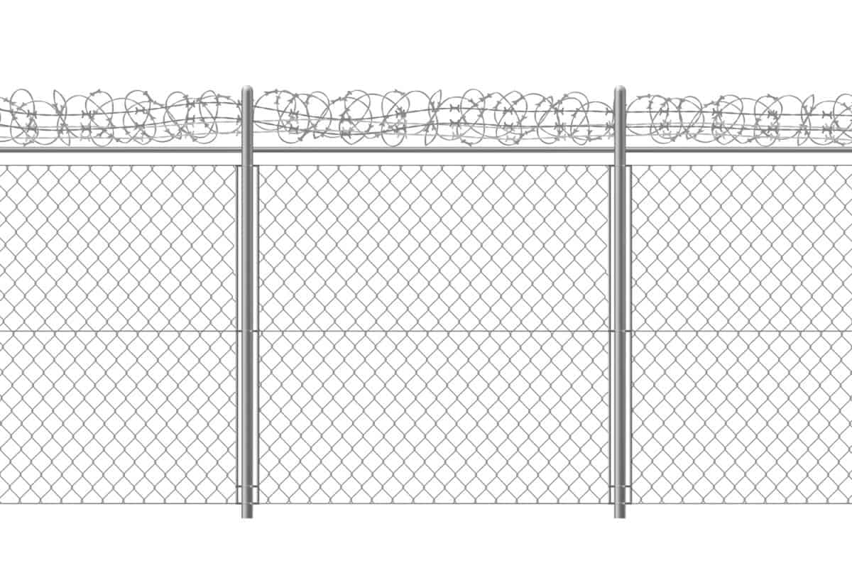 Chain-link fence fragment with metallic pillars and barbed or razor wire  realistic vector illustration isolated on white background. Secured territory, protected area or prison fencing
