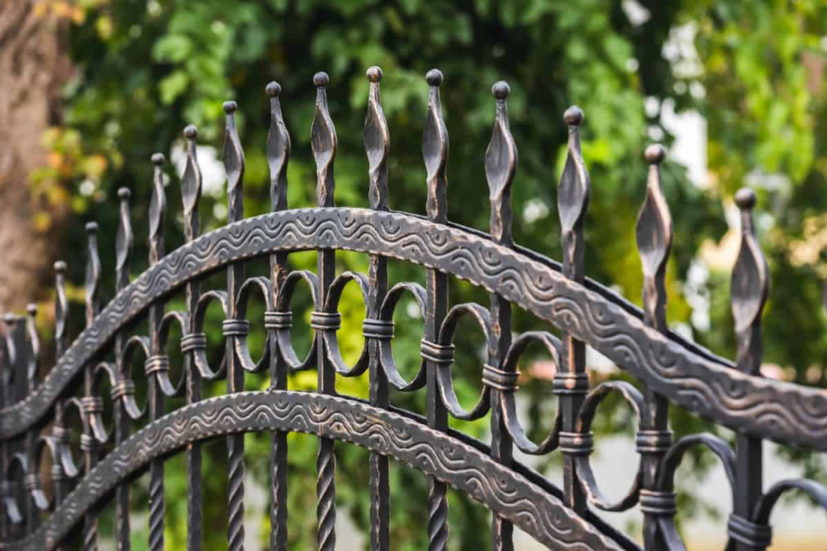 Classic mid century inspired wrought iron fence