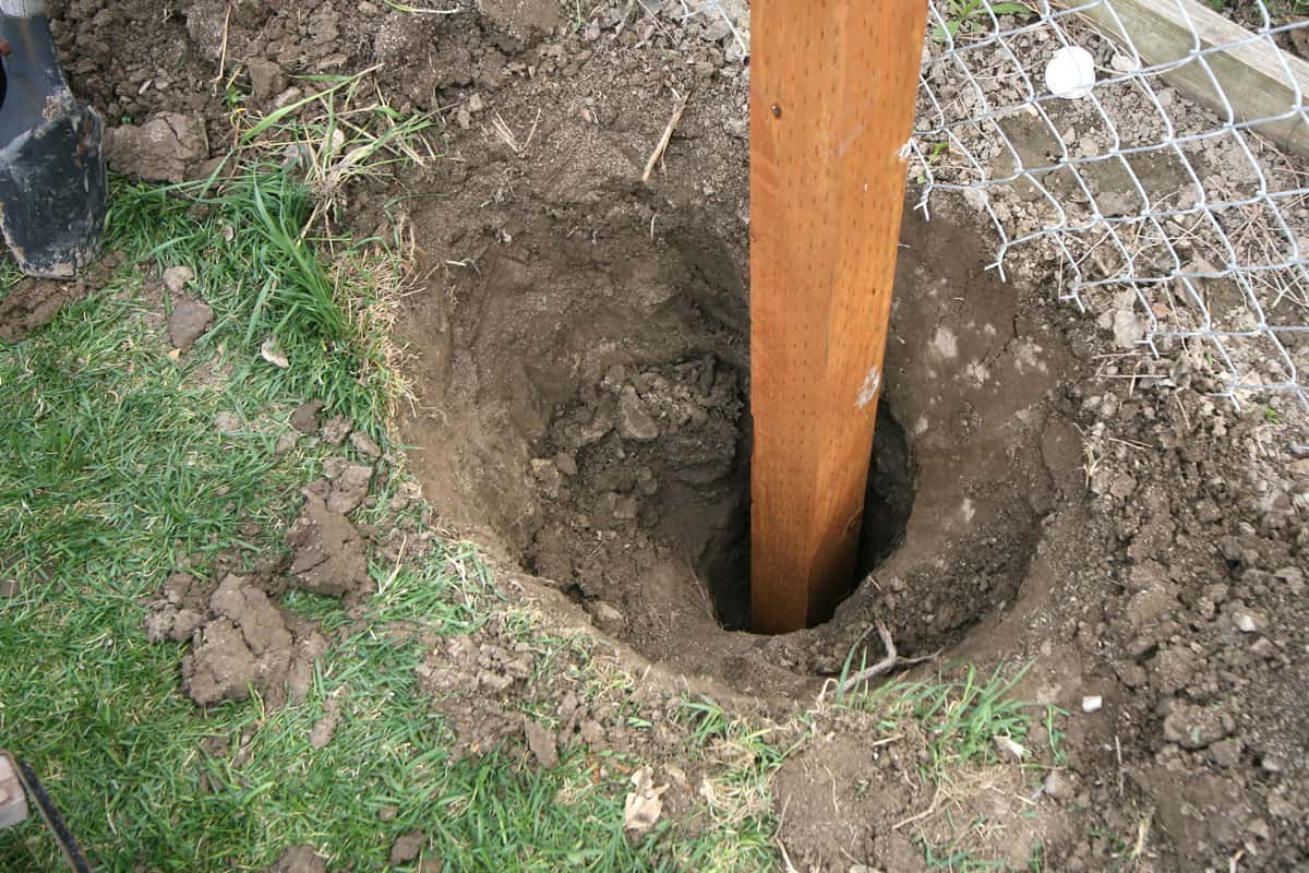 Digging a hole for a post for fence