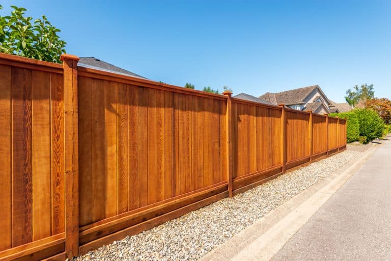 Fence built from wood. Outdoor landscape, How to Anchor a Fence