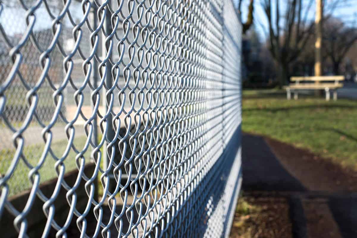 Metal fence cage closeup in a park