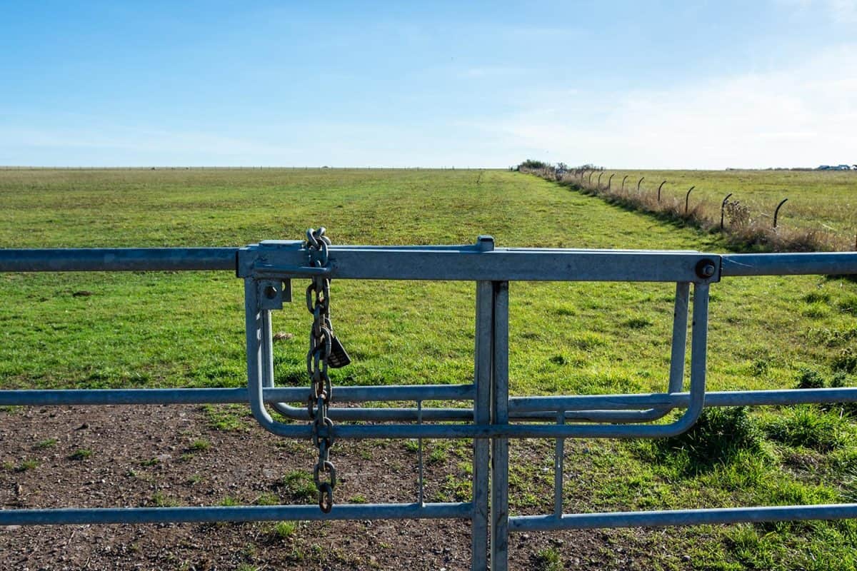 Metal gate to the vast grassland