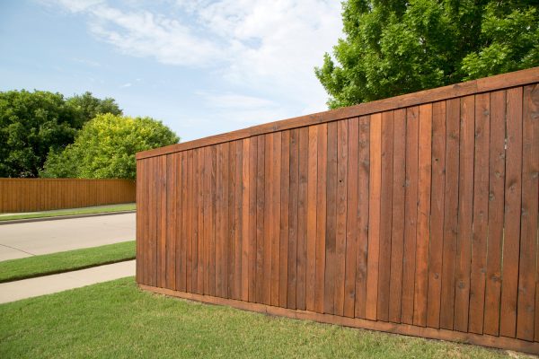 Nice wooden fence around house - Should You Use Roofing Tar On Fence Posts