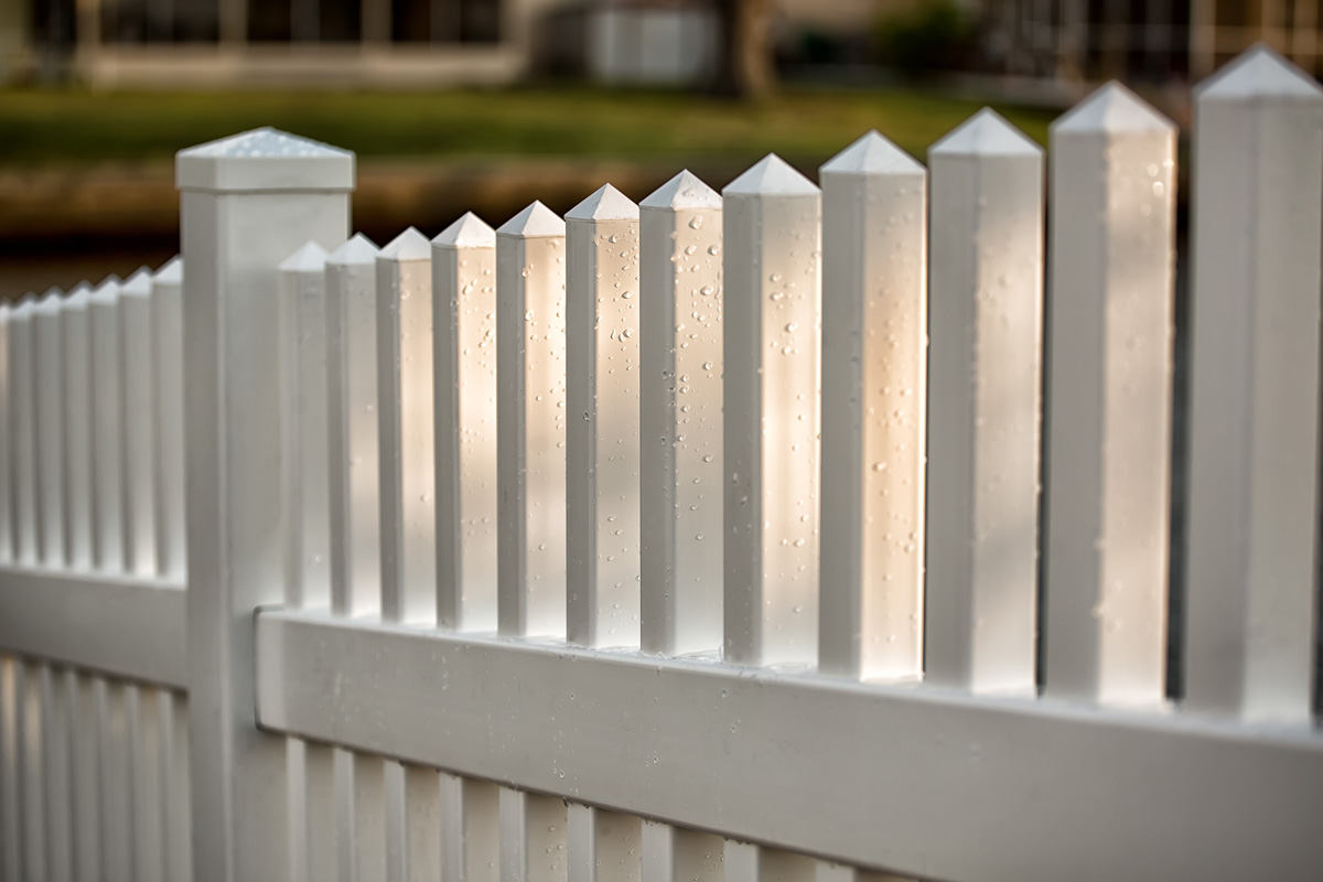 Vinyl Picket Fence with water drops
