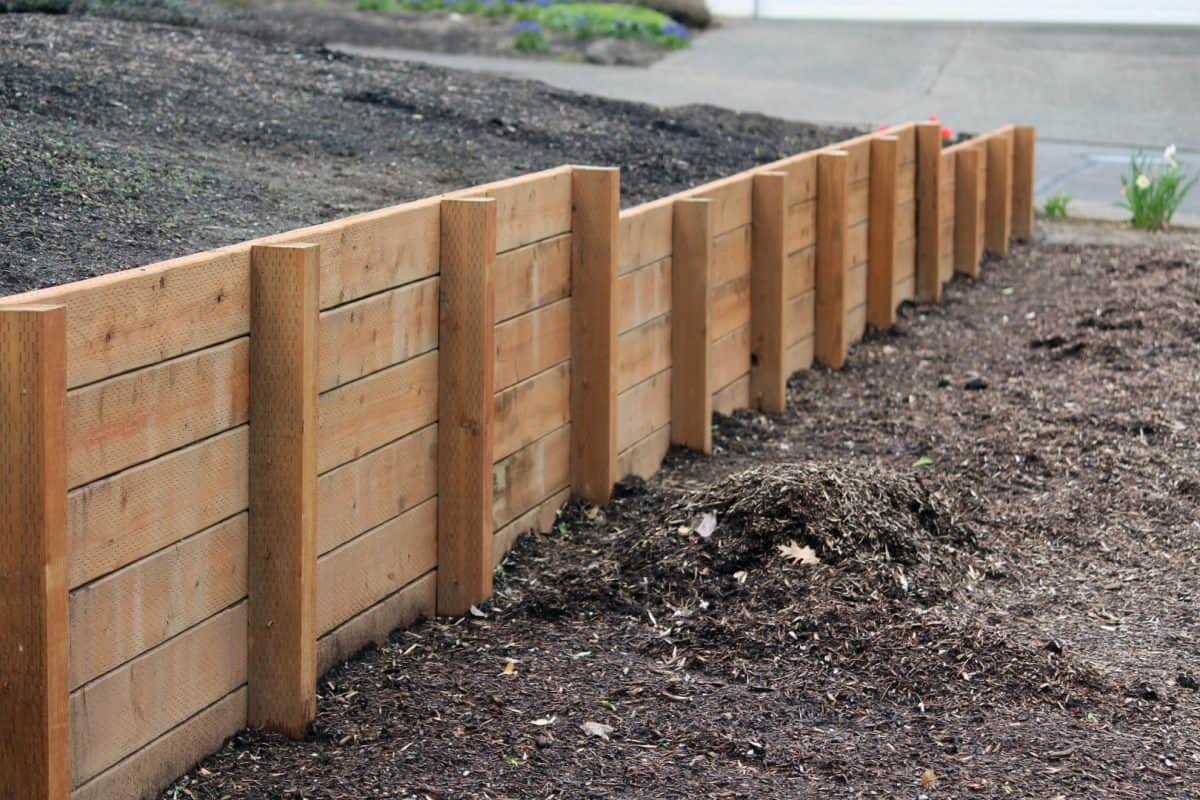 Stepped fencing showing distance between posts